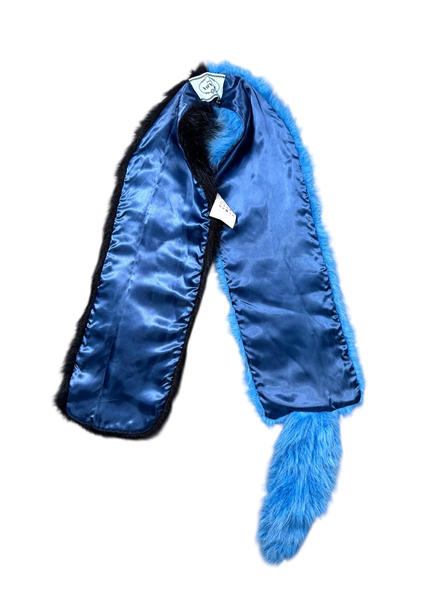 Prada SS11 blue and black fur scarf on a white background
