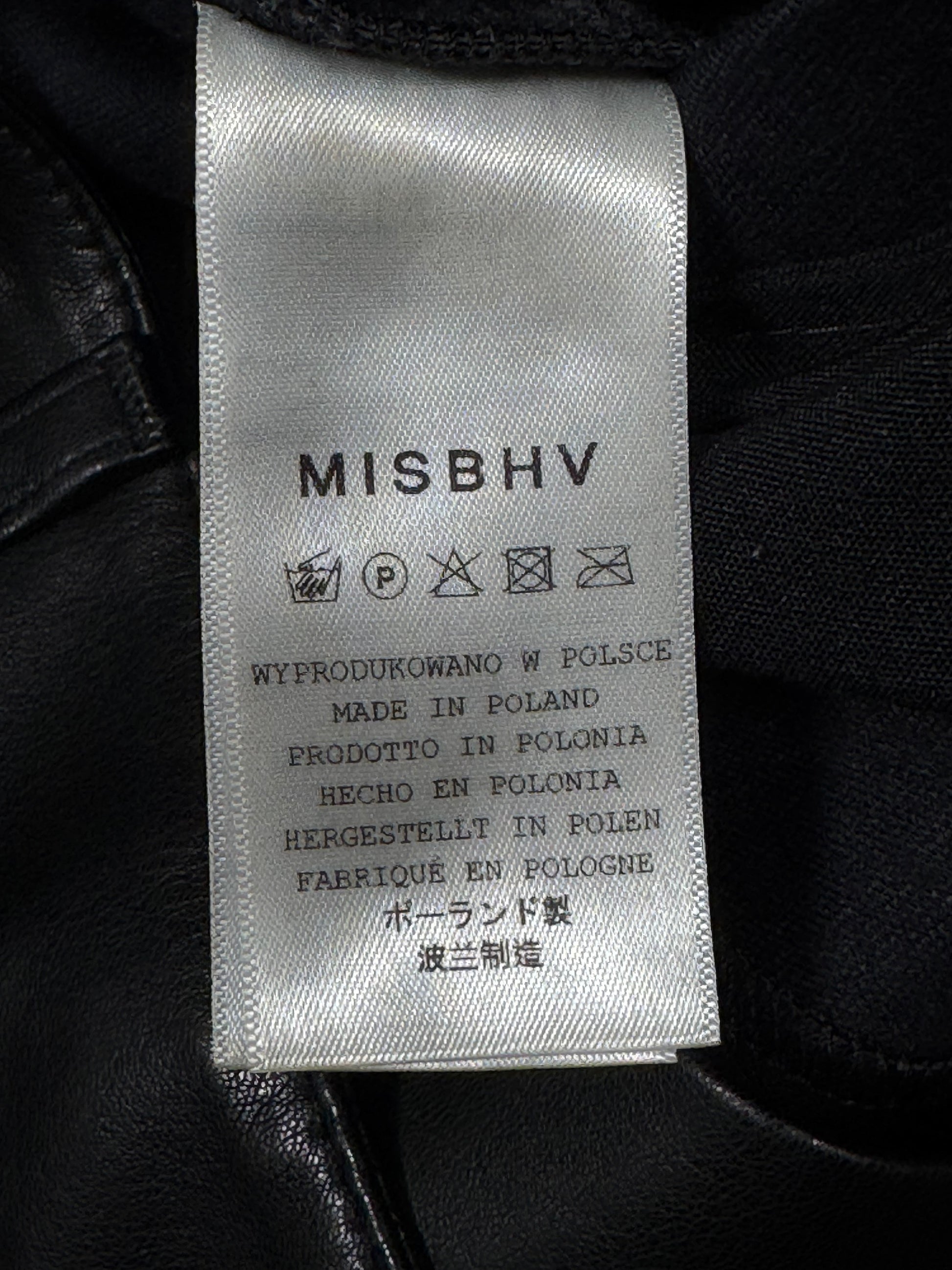 MISBHV label on a black leather jacket