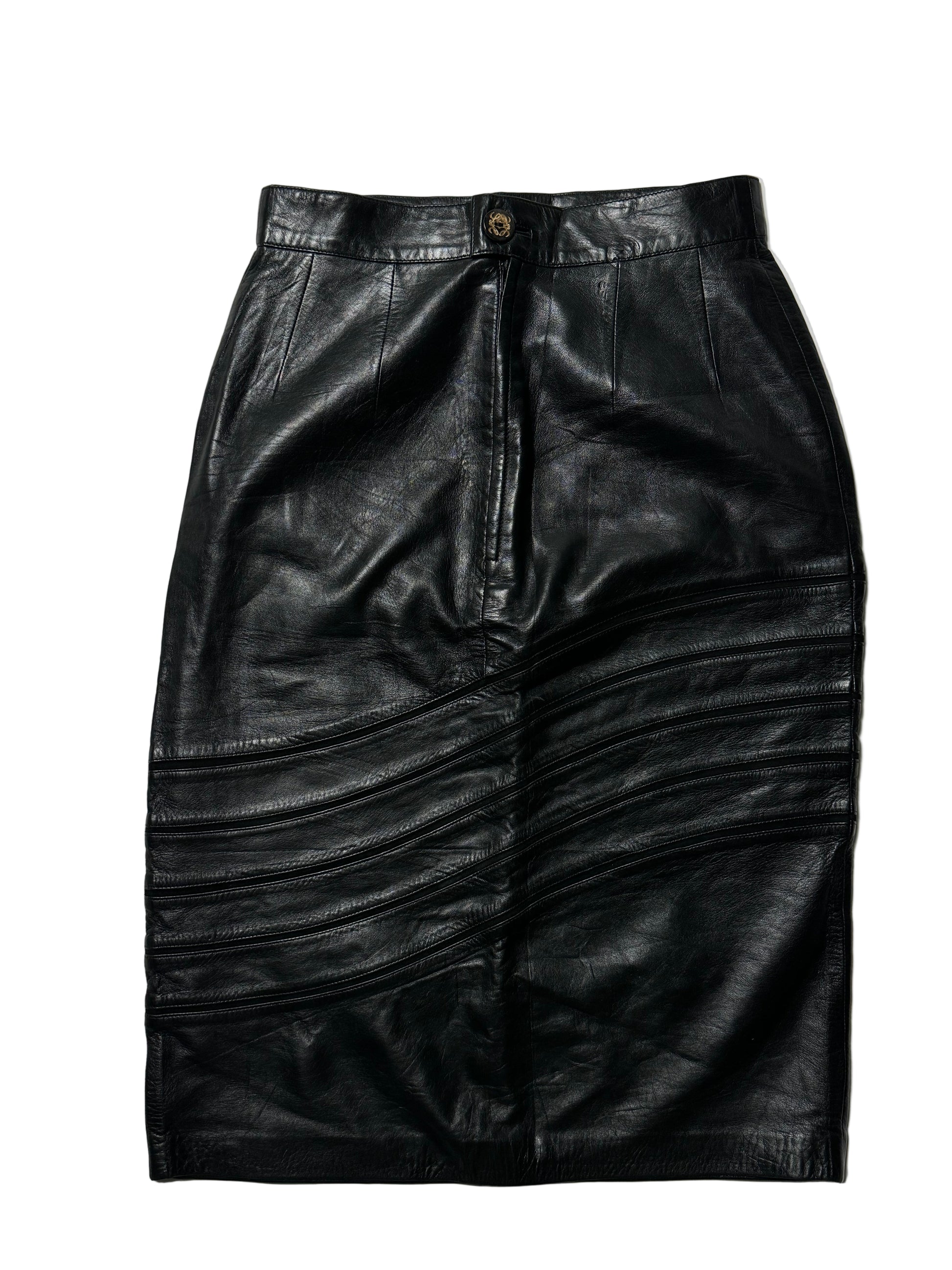 A black leather pencil skirt with a button at the front, featuring a swerve design on the front and back.