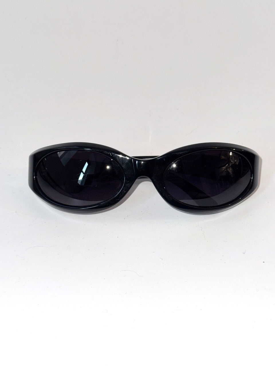 Black sunglasses on a white background