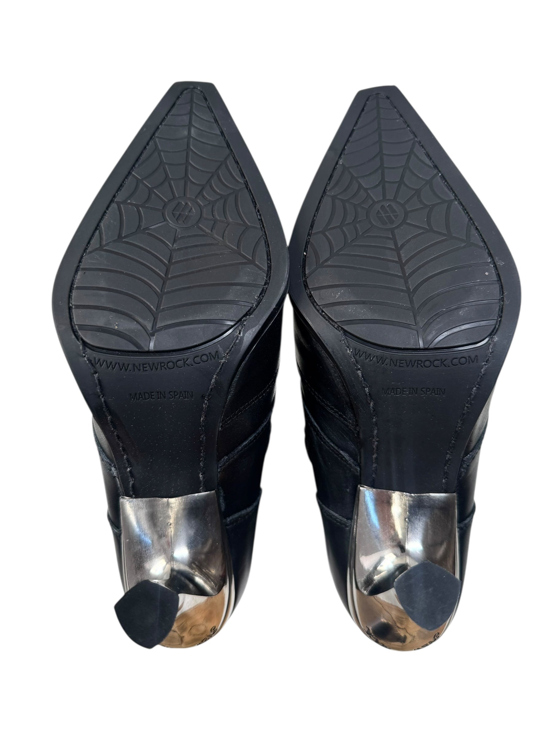 Vetements black high-heeled boots on a white background