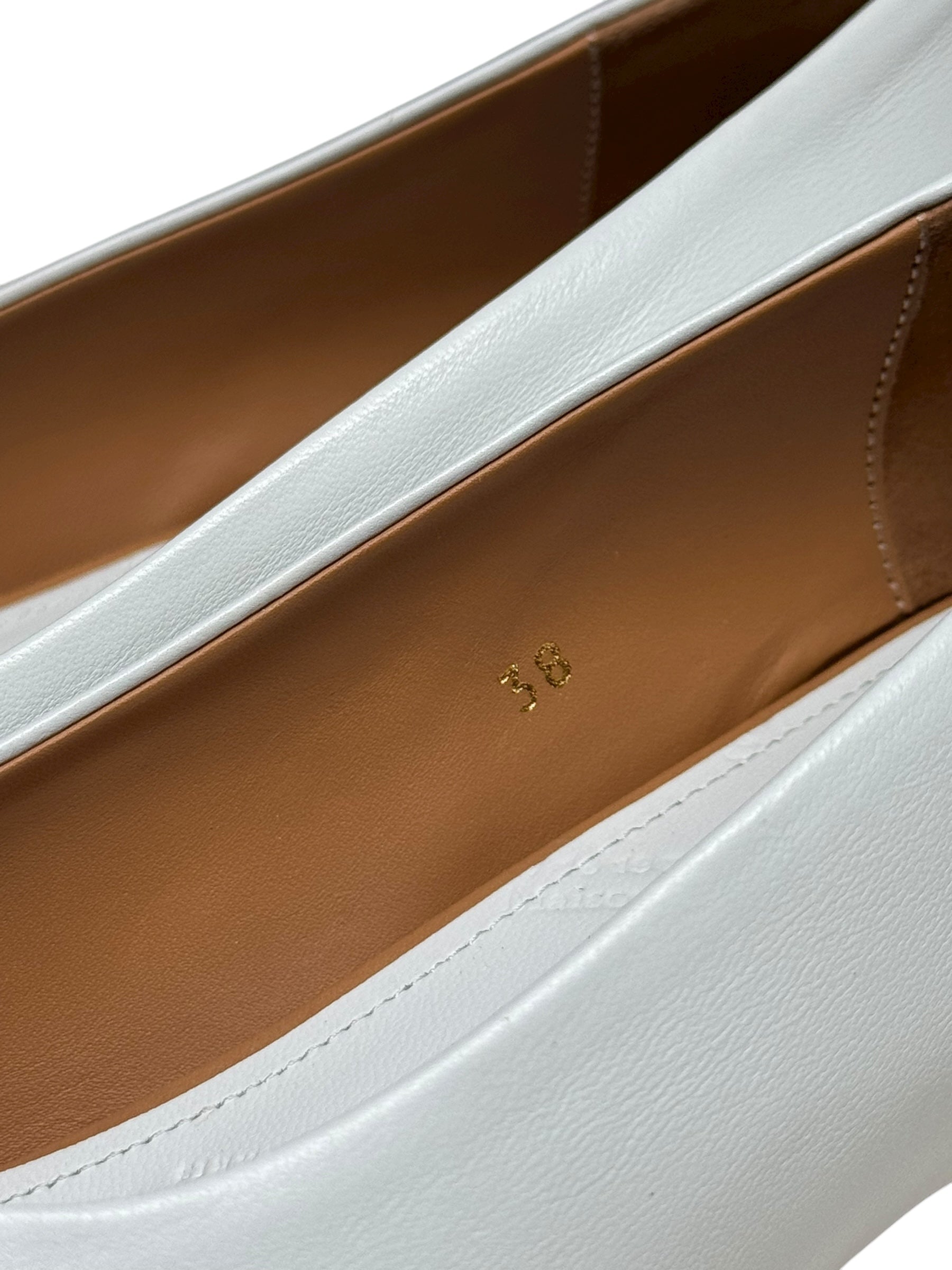 White leather flat margiela 4 stitch shoes on a white background