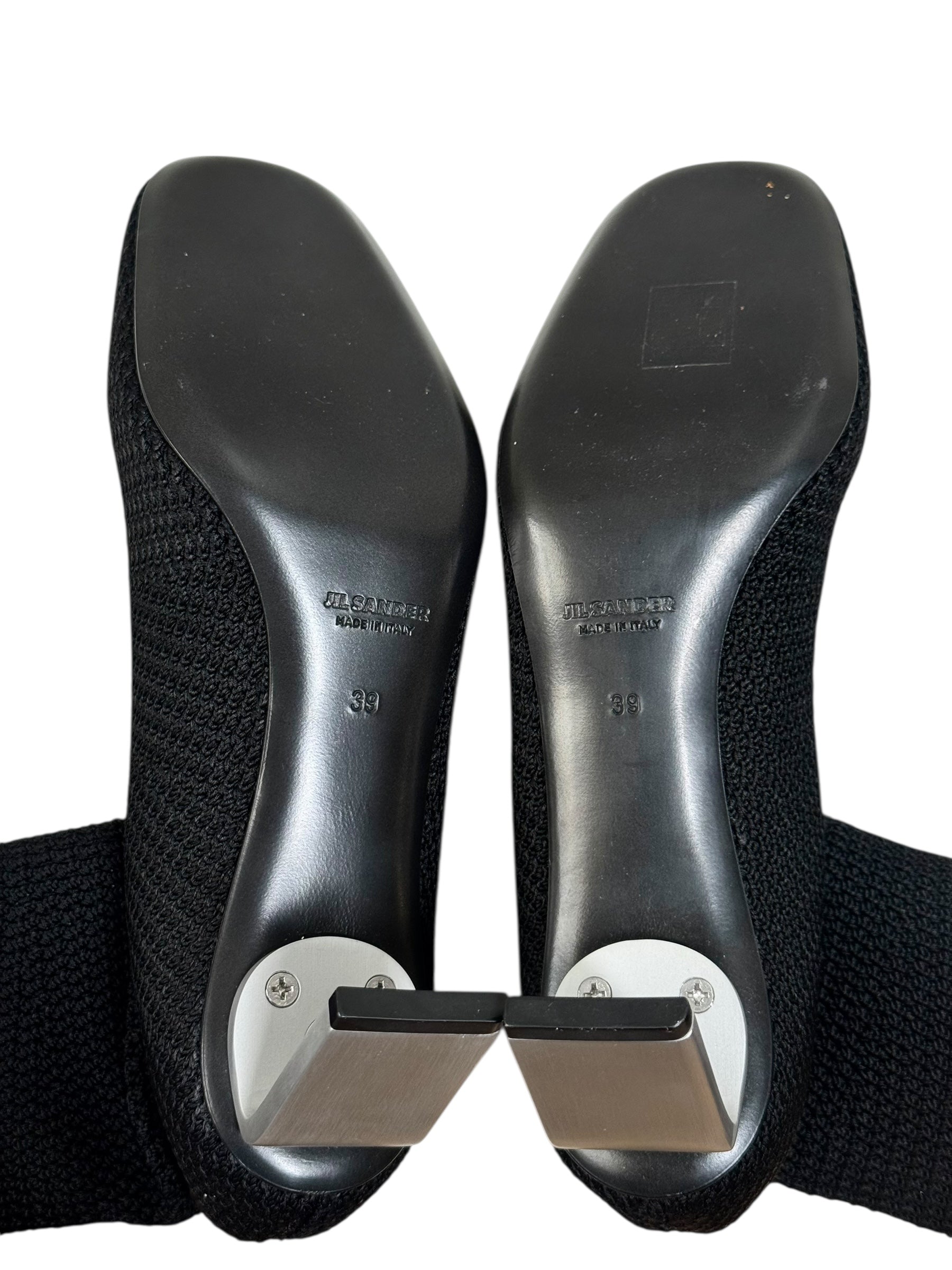 Jil Sander sock-style high heels on a white background