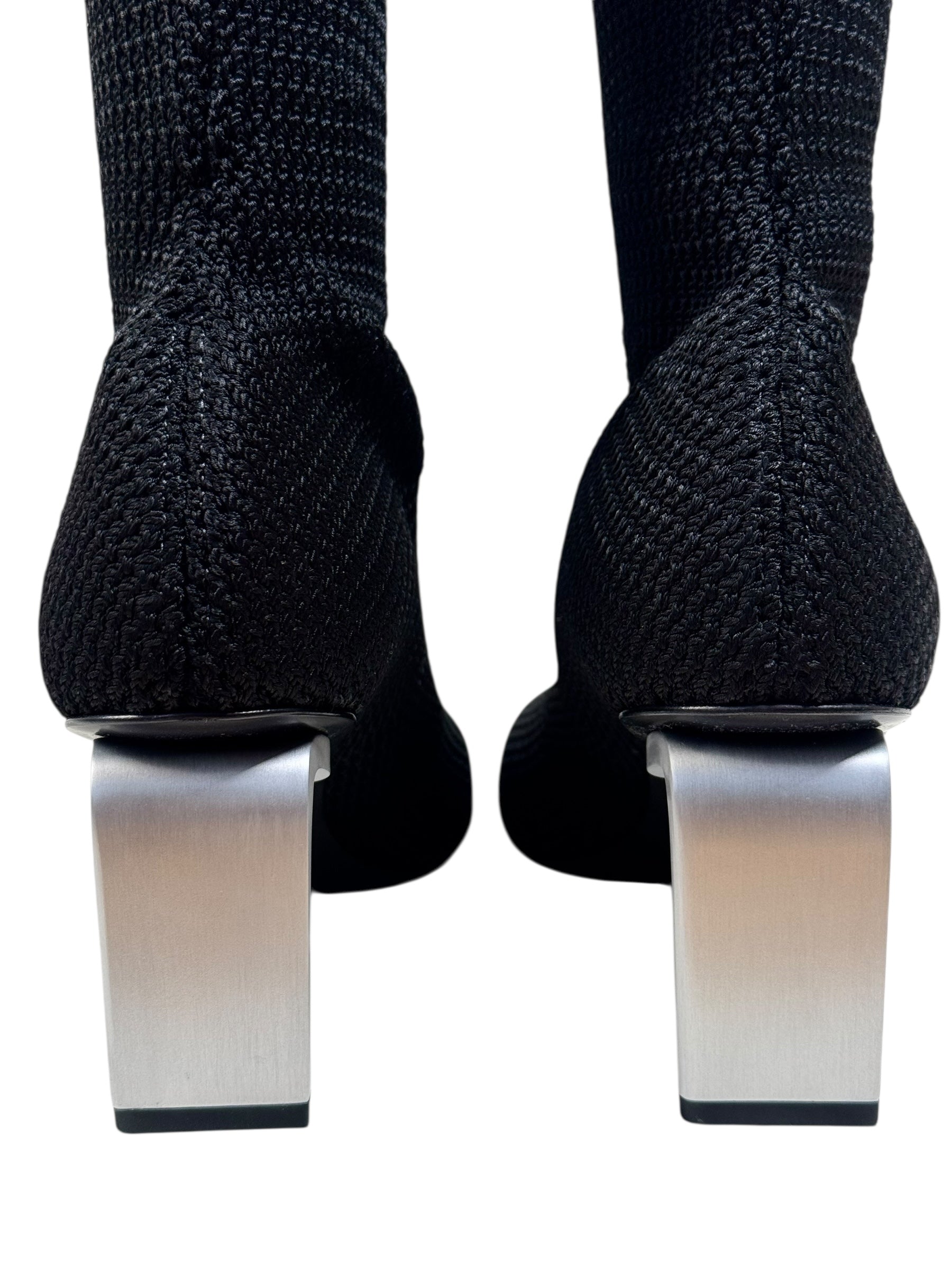 Jil Sander sock-style high heels on a white background