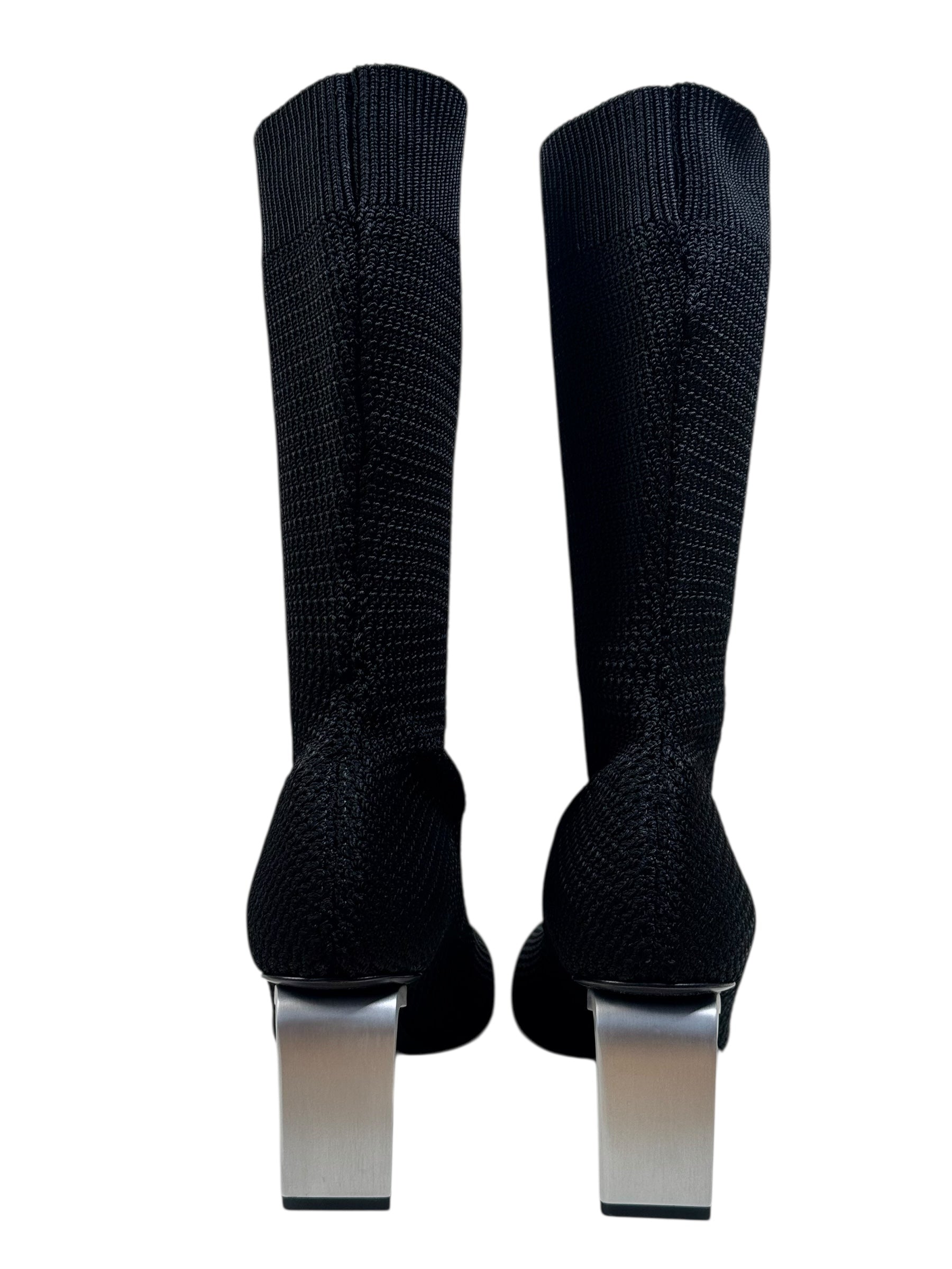 Jil Sander sock-style high heels on a white background