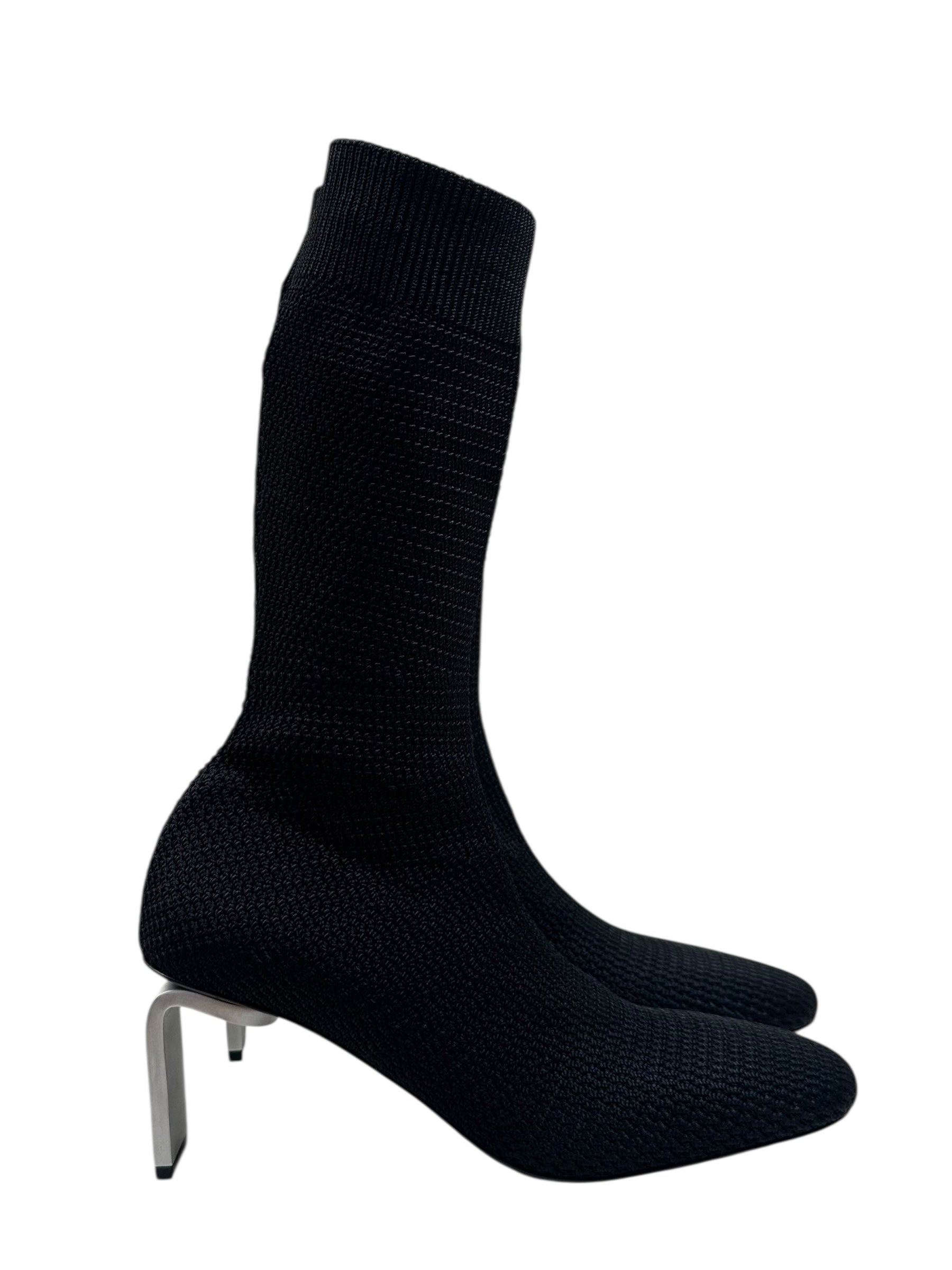Jil Sander sock-style high heels on a white background