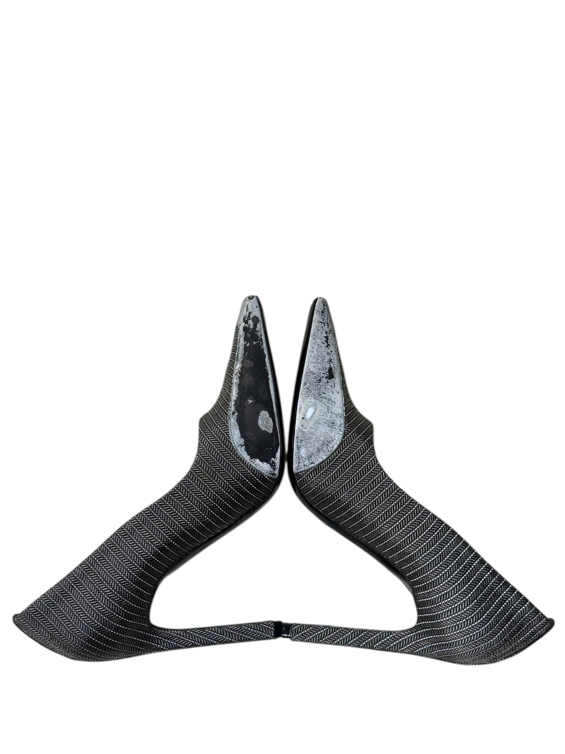 Balenciaga pair of gray pointed-toe shoes with Balenciaga logo on a white background