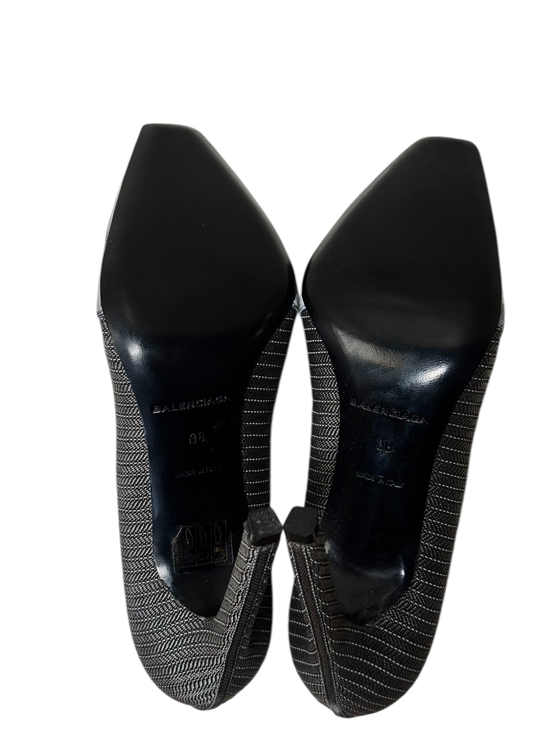 Balenciaga pair of gray pointed-toe shoes with Balenciaga logo on a white background