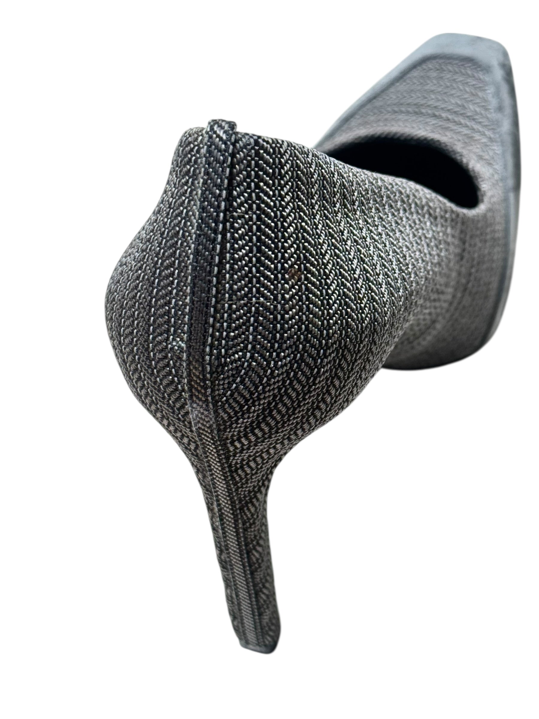 Balenciaga pair of gray pointed-toe shoes with Balenciaga logo on a white background