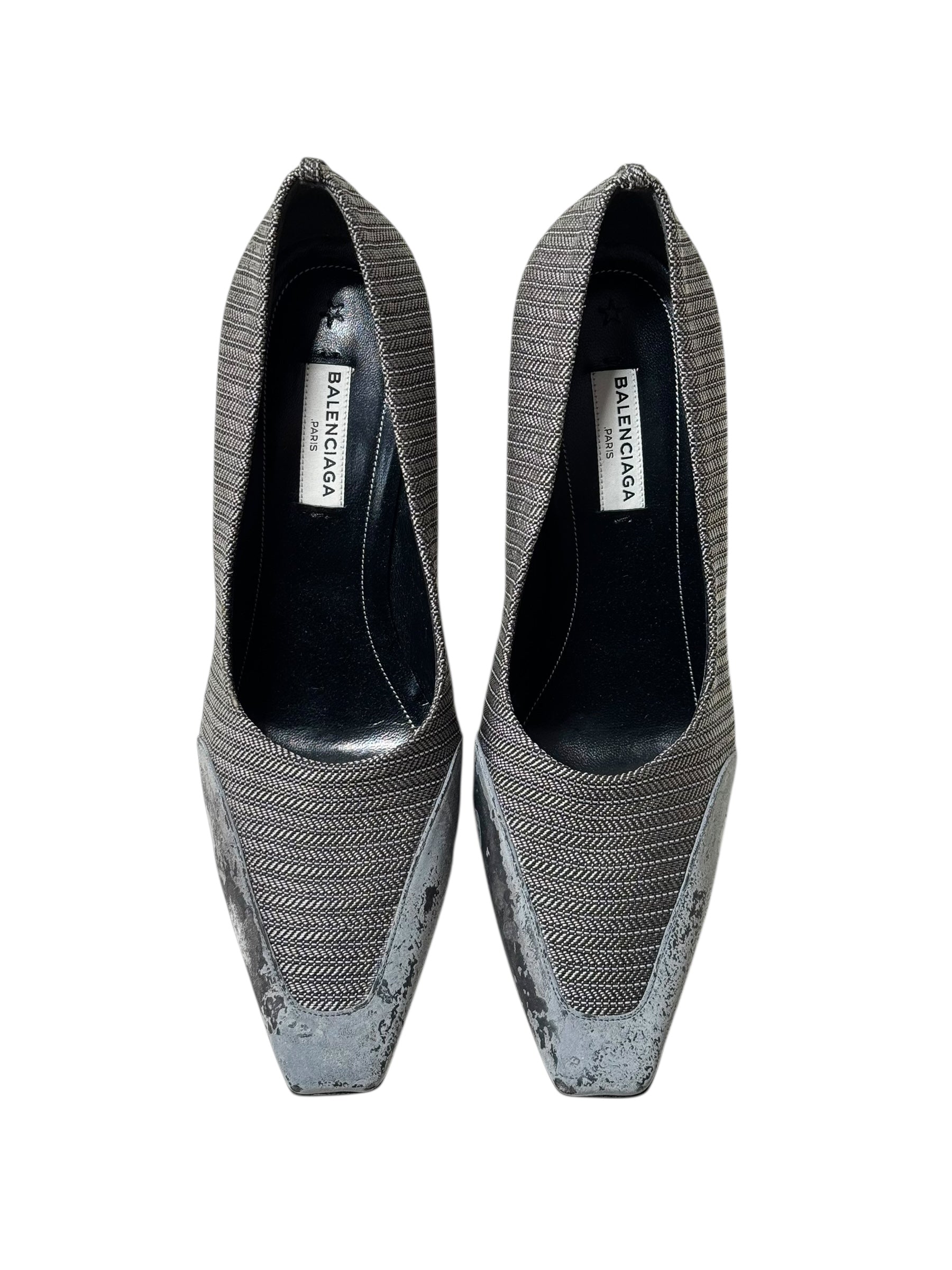 Balenciaga pair of gray pointed-toe shoes with Balenciaga logo on a white background
