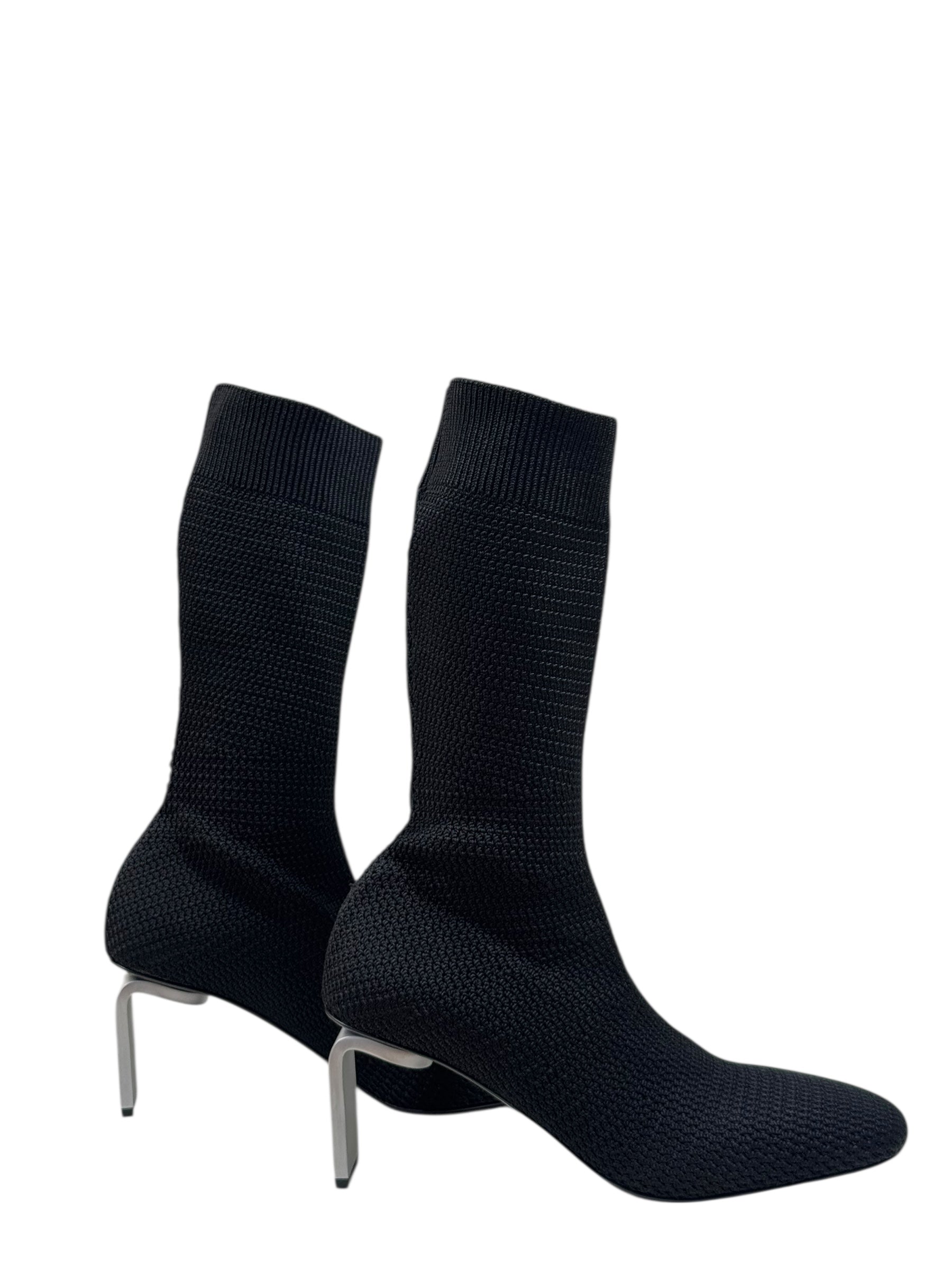 Jil Sander sock-style high heels on a white background