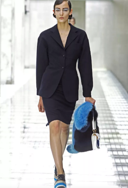 PRADA SS11 lady walking in a runway with a vintage pre loved prada blue faux fur