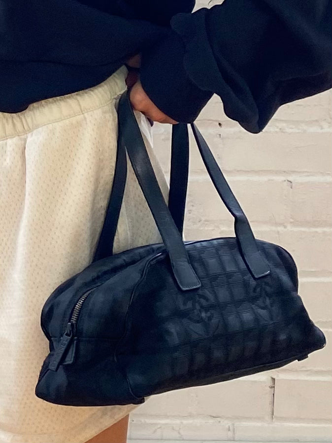 CHANEL TRAVEL LINE BAG